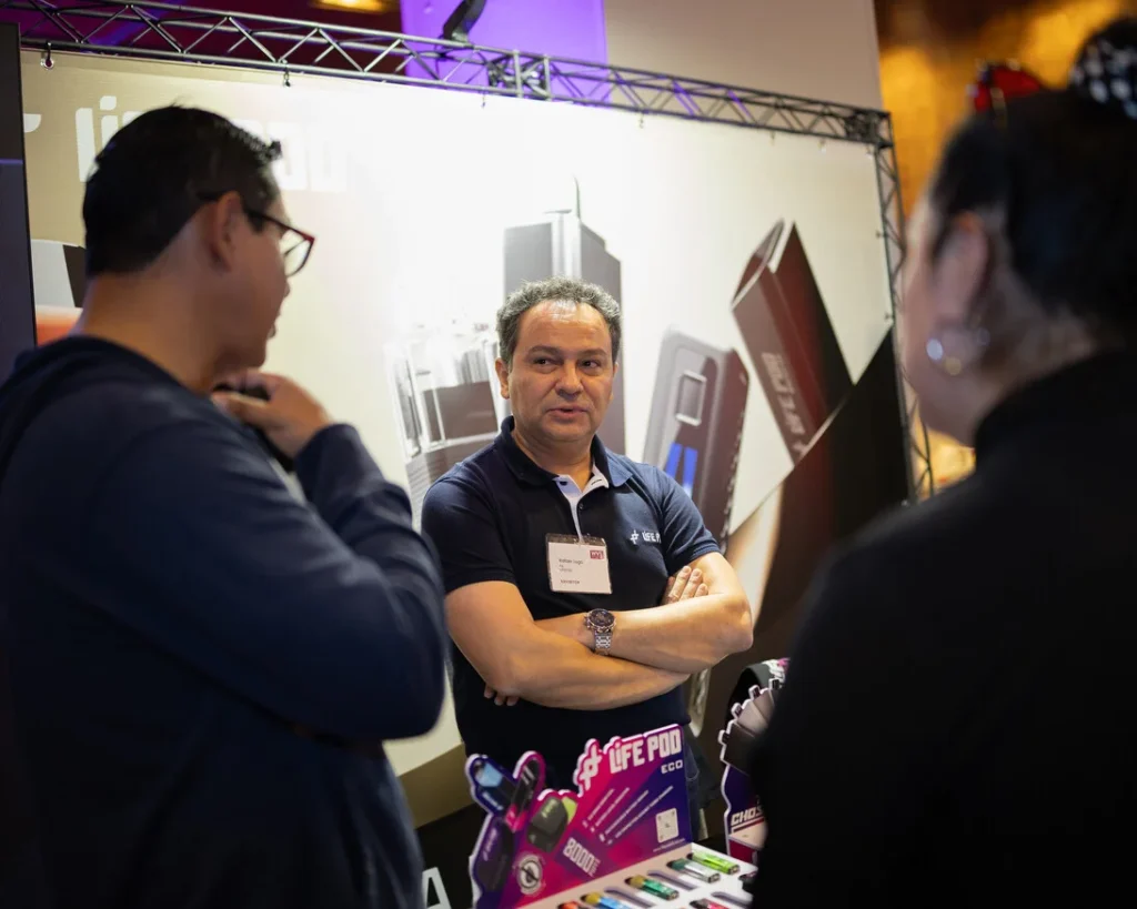Life Pod team talking with industry visitors