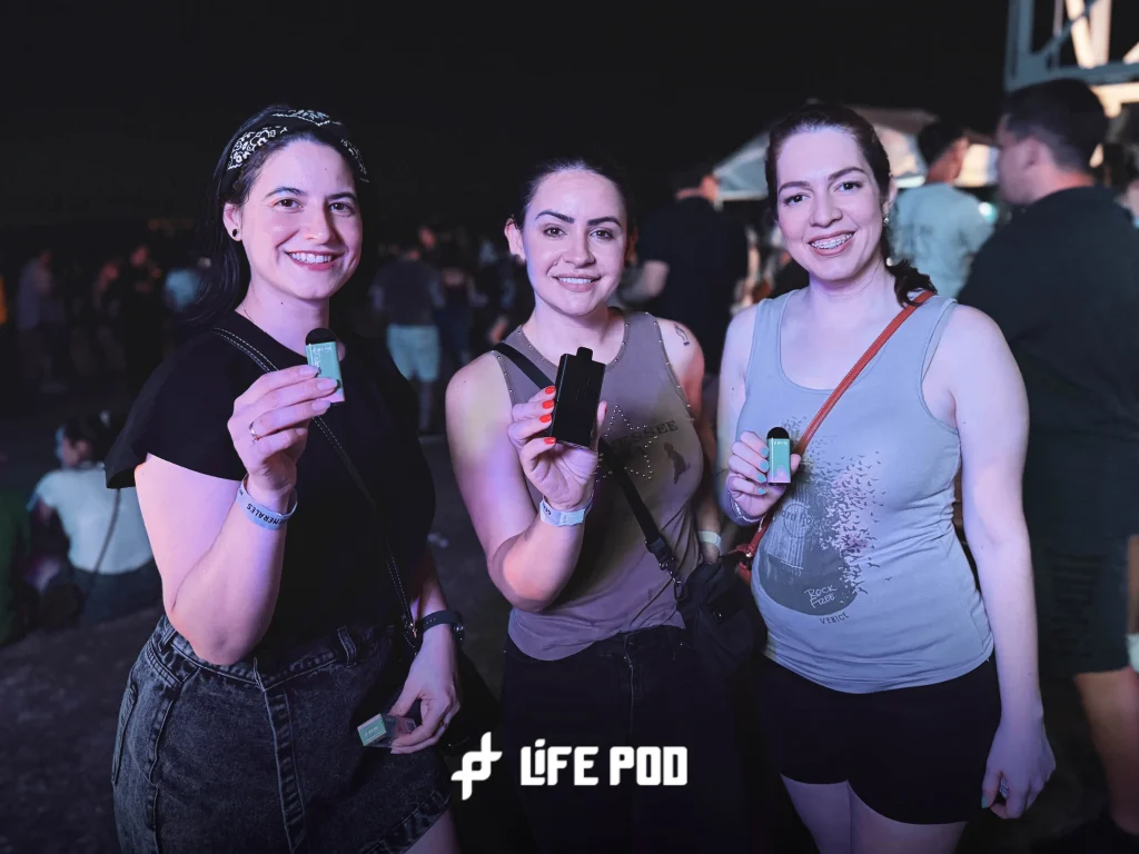 Festival-goers holding Life Pod devices at Reciclarte 2026