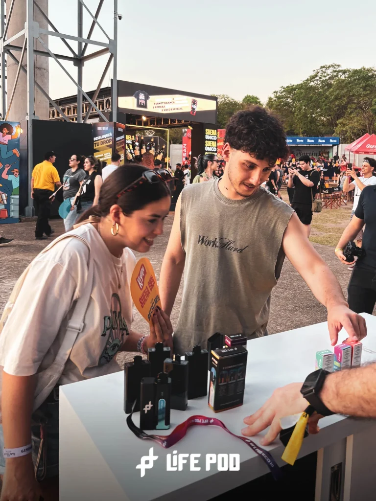 Visitors discovering the Life Pod lineup at the stand counter